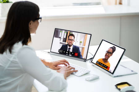 Video Conferencing Webinar Meeting. Watching Online On Multiple Screensの写真素材