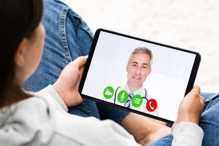 Telemedicine Video Call To Doctor On Tablet