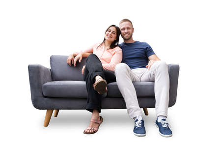 Couple Moving Couch Or Sofa Together. Furniture Moversの写真素材