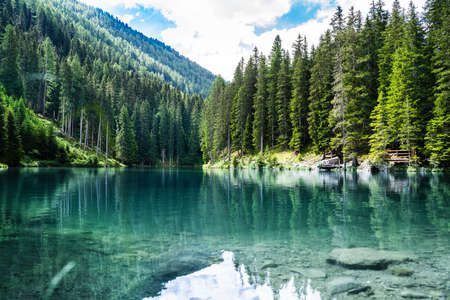 Lake In Mountains. Austrian Alps Travel Background