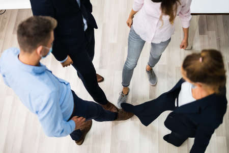 Feet Tap Greet To Avoid And Stop Covid Or Fluの写真素材