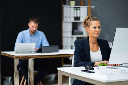 Business Team Training. Working On Computers Social Distancingの写真素材