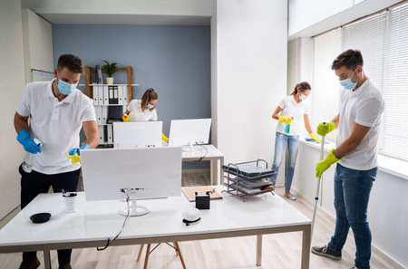 Professional Office Cleaning Services With Face Masksの写真素材