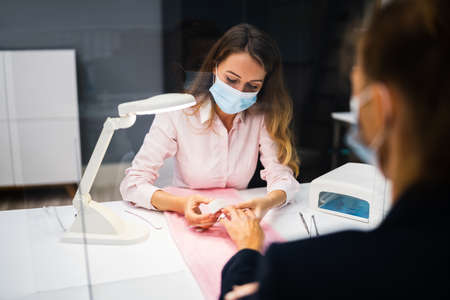Nails Cleaning Care And Manicure Service With Face Masksの写真素材