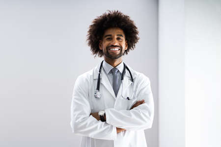 African American Doctor With Stethoscope At Healthcare Labの写真素材