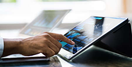 African American Financial Business Advisor Using Computer