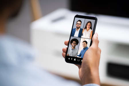 African American Video Chatting On Mobile Phone