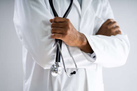 African American Doctor With Stethoscope At Healthcare Labの写真素材