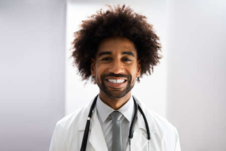 African American Doctor With Stethoscope At Healthcare Labの写真素材