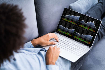 African American Man Broker Trading Stock Exchange