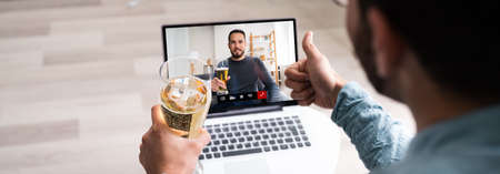 Online Virtual Beer Drinking Party On Laptop