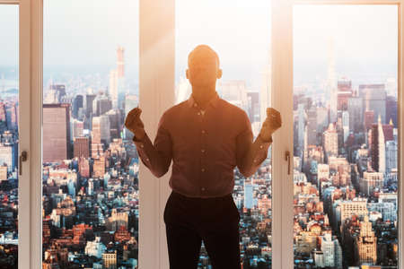 African American Man Standing Doing Business Meditation In Officeの写真素材