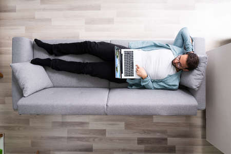 Watching Internet TV Video Or Movie On Laptop Computerの写真素材