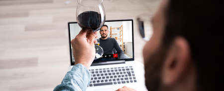 Online Virtual Wine Drinking Party On Laptopの写真素材
