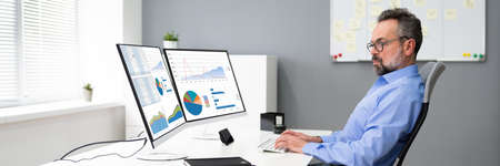Analyst Advisor Using Data Graphs On Computer Screen