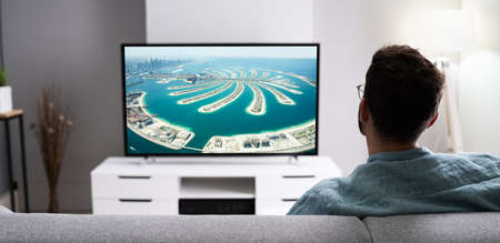 Watching TV Movie On Couch In Living Room