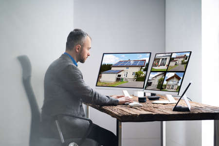 Real Estate Home Photos On Computer Screen