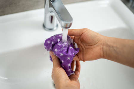 Cleaning Reusable Face Mask Against Covid-19 Virusの写真素材