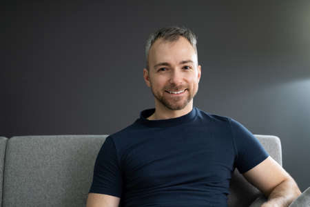 Man Portrait At Home In Video Conferenceの写真素材