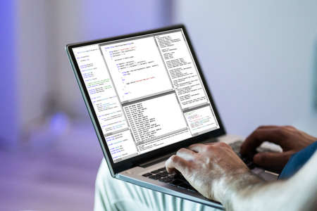Software Developer Programmer Working On Laptop Computer