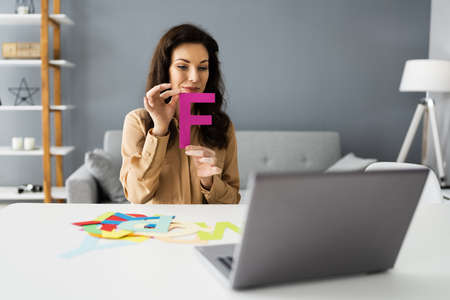 Elementary School Teacher Woman In Video Call Explaining