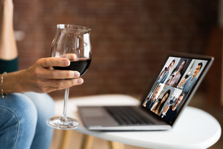 Virtual Wine Tasting Dinner Event Online Using Laptopの写真素材