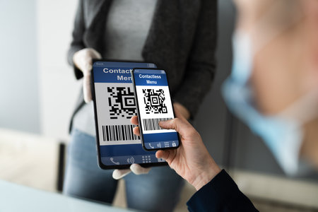 Customer Scanning Online Menu Code With Smartphone Wearing Face Maskの写真素材