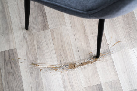 Broken Laminate Floor Damage. Destroyed House Flooringの写真素材