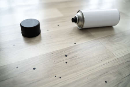 Damaged Laminate Flooring Surface From Spray Paintの写真素材