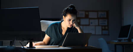 Late Night Workaholic Busy Business Woman At Computer