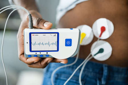 African American Patient Using Electrodes Diagnostic Deviceの写真素材