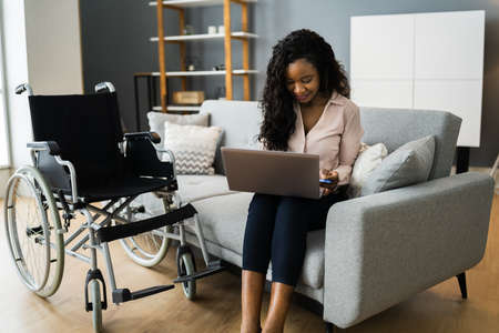 African Woman At Home Using Computer For Video Conferenceの写真素材