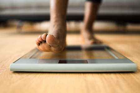 Weightloss Check After Workout. Weighing Scale Measureの写真素材