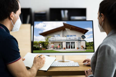 Buying Real Estate House Property In Face Maskの写真素材
