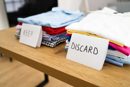 Tidying Sorting Fashion Clothes And Shirts. Purge Concept