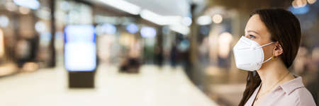 Retail Store Shopping With Coronavirus Ffp2 Face Maskの写真素材