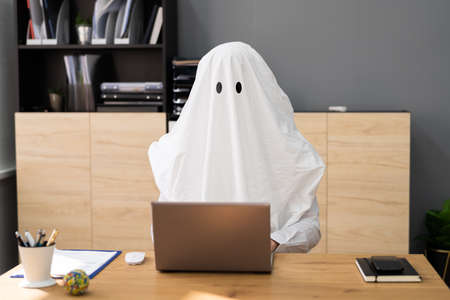 Ghostwriter In Office. Creative Ghost Writer Using Computerの写真素材