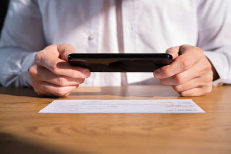 Remote Check Deposit Using Mobile Remote. Online Captureの写真素材