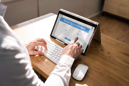 Booking Meeting Appointment On Laptop Computer Online