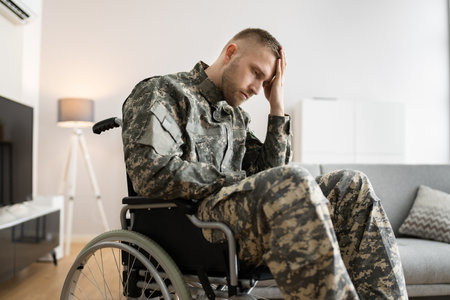 Disabled Military Soldier In Wheelchair With PTSD After Injury And Trauma