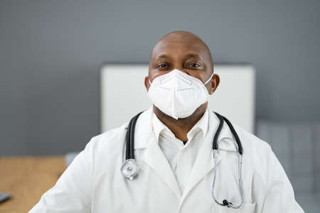 African American Man Doctor Wearing Medical Mask In Hospitalの写真素材