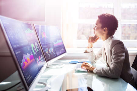 Financial Business Analytics Data Dashboard. Analyst Womanの写真素材