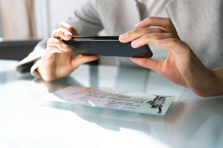 Remote Check Deposit Taking Photo With Mobile Phone