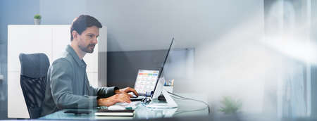 Man In Virtual Conference Training Meeting On Computer
