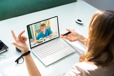 Teacher Online Meeting With Children. Teaching Classの写真素材