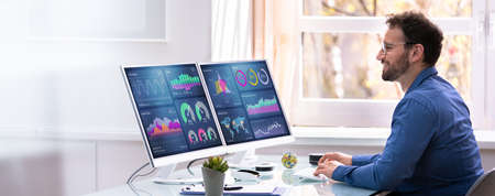KPI Business Analytics Data Dashboard. Analyst Using Computer