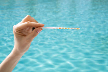 Pool Water Service. Chlorine Chemical Measure Outdoor