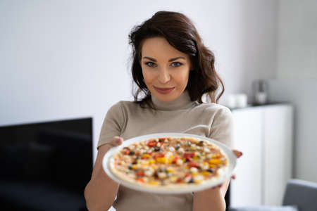 Online Virtual Cooking Class. Happy Woman Showing Pizza