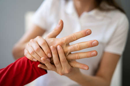 Reflexology Hand Massage And Physiotherapy. Elder Man Having Acupressure Therapy