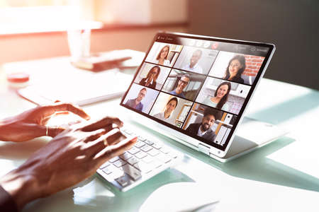 African American Watching Video Conference Business Webinarの写真素材